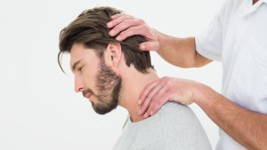 Neck adjustment by chiropractor